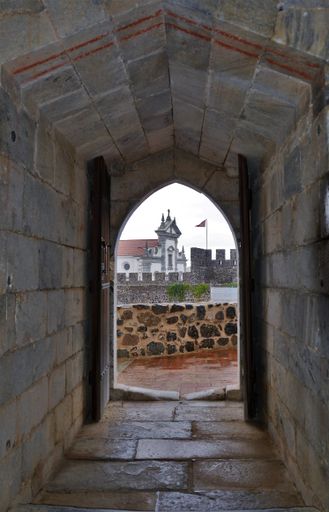A vertical shot of the window of a fortress in Beja city, Portugal