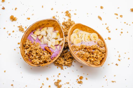 A closeup shot of vegan granola bowl with granola made from oats and chia seeds isolated on white background