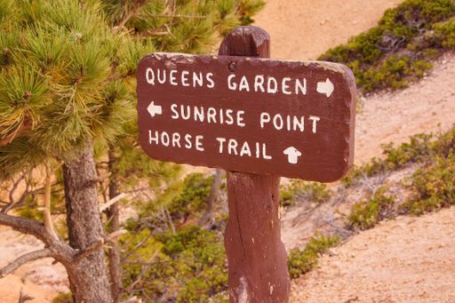 A wooden direction sign in Bryce Canyon National Park in the USA