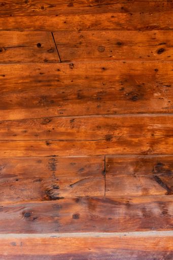 A vertical shot of old wooden planks perfect for background