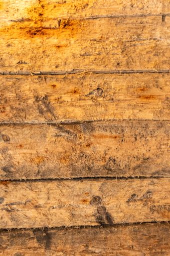 A vertical shot of old wooden planks perfect for background