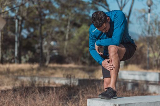 A closeup shot of a Hispanic male injured while exercising
