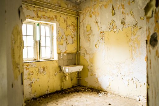 A closeup shot of old decayed walls of the Amiantos Abandoned Hospital in Cyprus