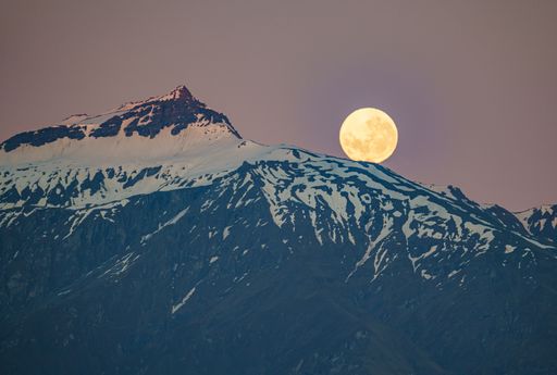 The moon behind the Black Peak, Southern Alps, New Zealand