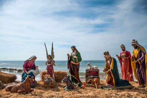 The holy figures demonstrating the birth of Christ on the shore of the ocean