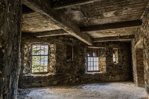 A closeup shot of an abandoned Berengaria hotel from inside in Troodos, Cyprus