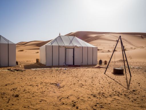 A white Berber tent in the Sahara Desert, Morocco during the daytime