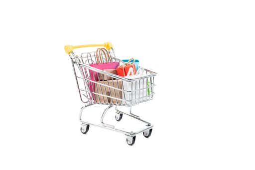 A shopping cart with gifts isolated on white background