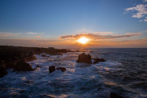 A scenic view of the ocean and cliffs during a mesmerizing sunset. Sines, Portugal.