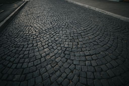 A closeup of the old cobblestone pavement
