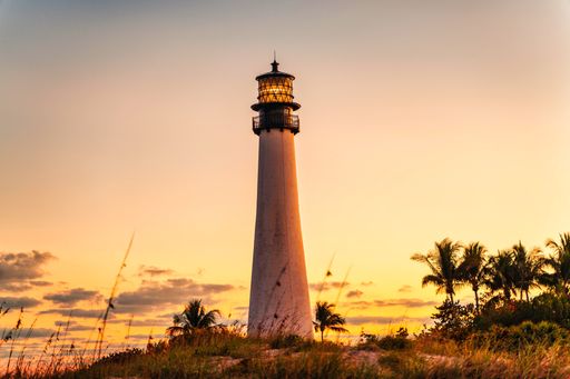 The Cape Florida Lighthouse in Bill Baggs State Park at sunset