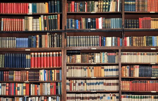 A library with many books at Octavian Goga memorial house in Ciucea village - Romania