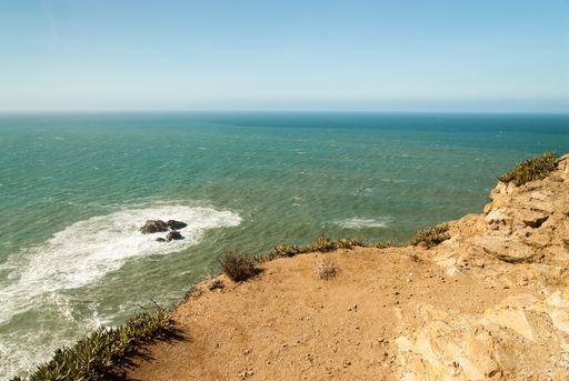 A landscape of the Cabo da Roca surrounded by the sea under the sunlight in Portugal