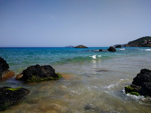 A shot of rocky beach during sunny weather in Ibiza, Spain