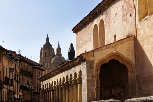 A shot of arches and a short building next to Plaza de Medina del Campo in Segovia, Spain