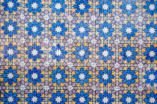A colourful pattern painting on the wall under the lights - a cool picture for backgrounds