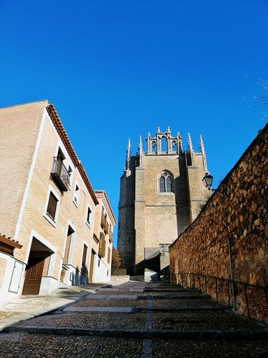 A vertical shot of a walkway leading to Monastery of San Juan de Los Reyes Toledo, Spain