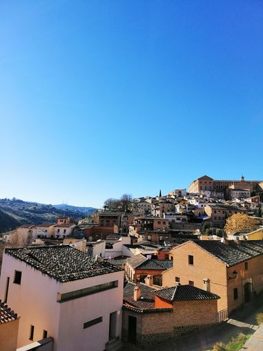 A vertical shot of houses in the city of Toledo, Spain