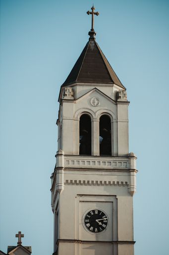 The clock tower of an old Catholic church in Brcko district, Bosnia and Herzegovina