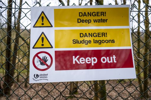 A sign warning against entry due to deep water