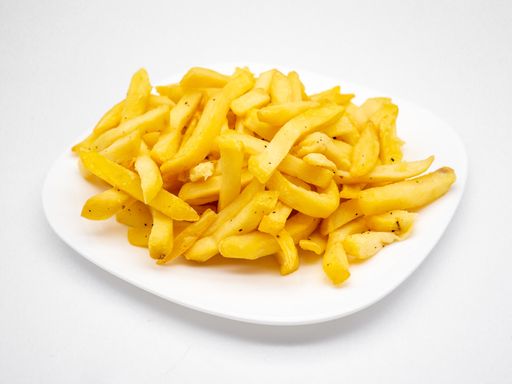 An appetizing french fries on a plate against a white background