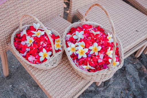 A closeup shot of wickered baskets of plucked flowers