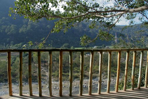 A decorative bamboo fence on the terrace under the sunlight