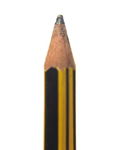 A vertical shot of a black pencil isolated on a white background