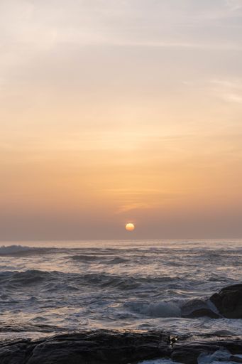 A vertical shot of scenic sunset