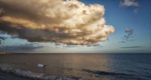 A beautiful seascape under a scenic and cloudy sky in Gran Canaria, Canary Islands