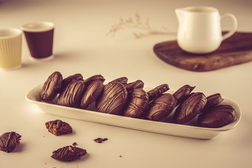 A plate of homemade chocolate cookies on a table