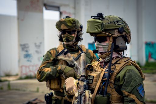 A closeup of special forces soldiers waiting for instructions