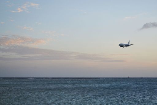 A flight of the plane above the ocean