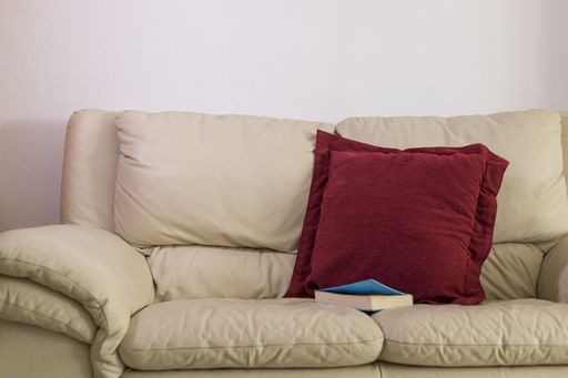 The sofa with a reading book on it