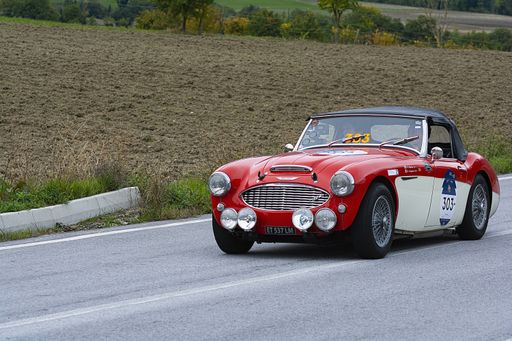 CAGLI , ITALY - OTT 24 - 2020: CAGLI , ITALY - OTT 24 - 2020: AUSTIN HEALEY 100 6 1957 an old racing car in rally Mille Miglia 2020 the famous italian