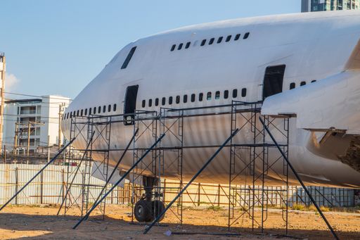 An old discarded airplane or jumbo jet is used as a restaurant, bar event,landmark and Thai Street Food Market in Thailand Asia
