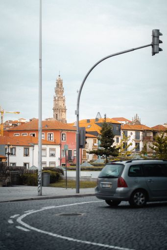 A vertical shot of street photography in Porto in Portugal showing the beauty of the city