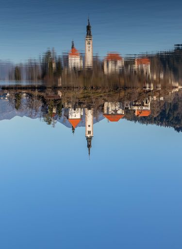 A beautiful shot of the old castle reflected in the water