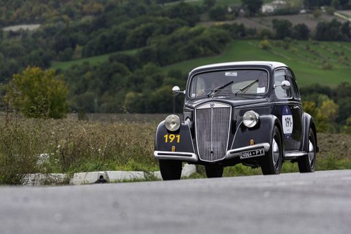 CAGLI , ITALY - OTT 24 - 2020: CAGLI , ITALY - OTT 24 - 2020: AUSTIN HEALEY 100 6 1957 an old racing car in rally Mille Miglia 2020 the famous italian