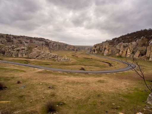 A road and fields in the Dobruja region of Romania