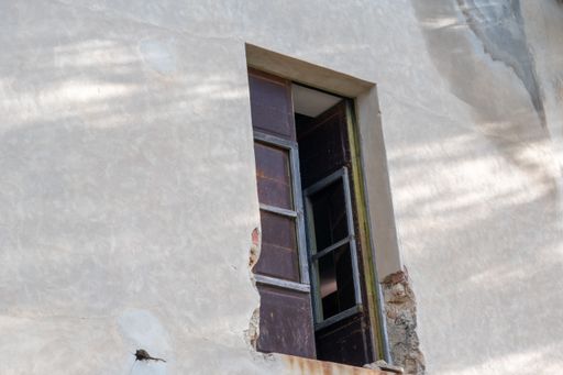 A facade of an old abandoned building