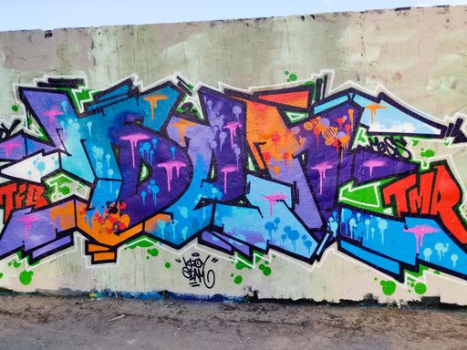Graffiti art on a wall in a street in Berlin