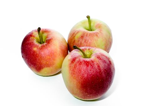 A closeup shot of red yellow apples isolated on a white background