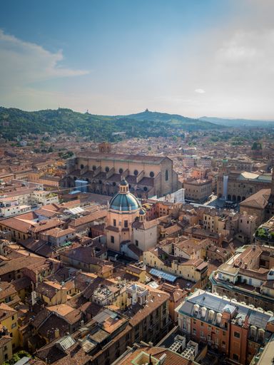 A vertical shot of streets and buildings of old town Bologna, Italy