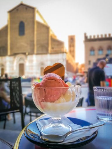 A vertical shot of ice cream in a cafe in Italy
