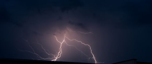A beautiful view of a flashing storm thunderstorm flash thunderbolts futuristic jena dramatic sky