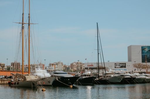 Many sail boats at Port Vell, beautiful marina in the bay of Barcelona, Catalonia, Spain