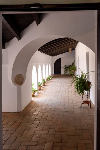 A vertical shot of the La Rabida Monastery in Huelva captured from the open corrido