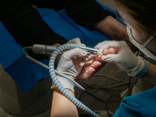 A podiatrist treats nail fungus, removes calluses, and heals an ingrown nail