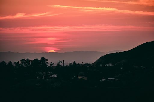 A scenic view of a beautiful sunset coloring the sky, Los Angeles, California